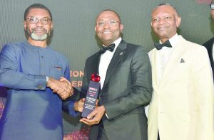 BusinessDay CEO with an awardee