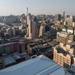 An image showing different buildings in an African city
