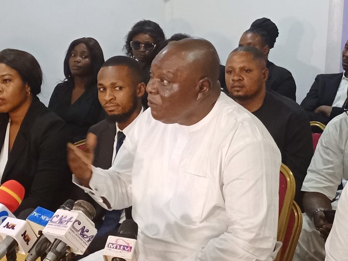 barrister Ambrose addressing the press