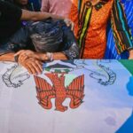 Akeredolu's widow cries on the coffin