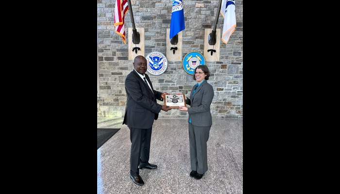 L-R: Isa Mudi, head of ISPS Code at NIMASA, being presented a souvenir by Juliet Hudson during a recent visit to the United States Coast Guard headquarters in Washington DC.