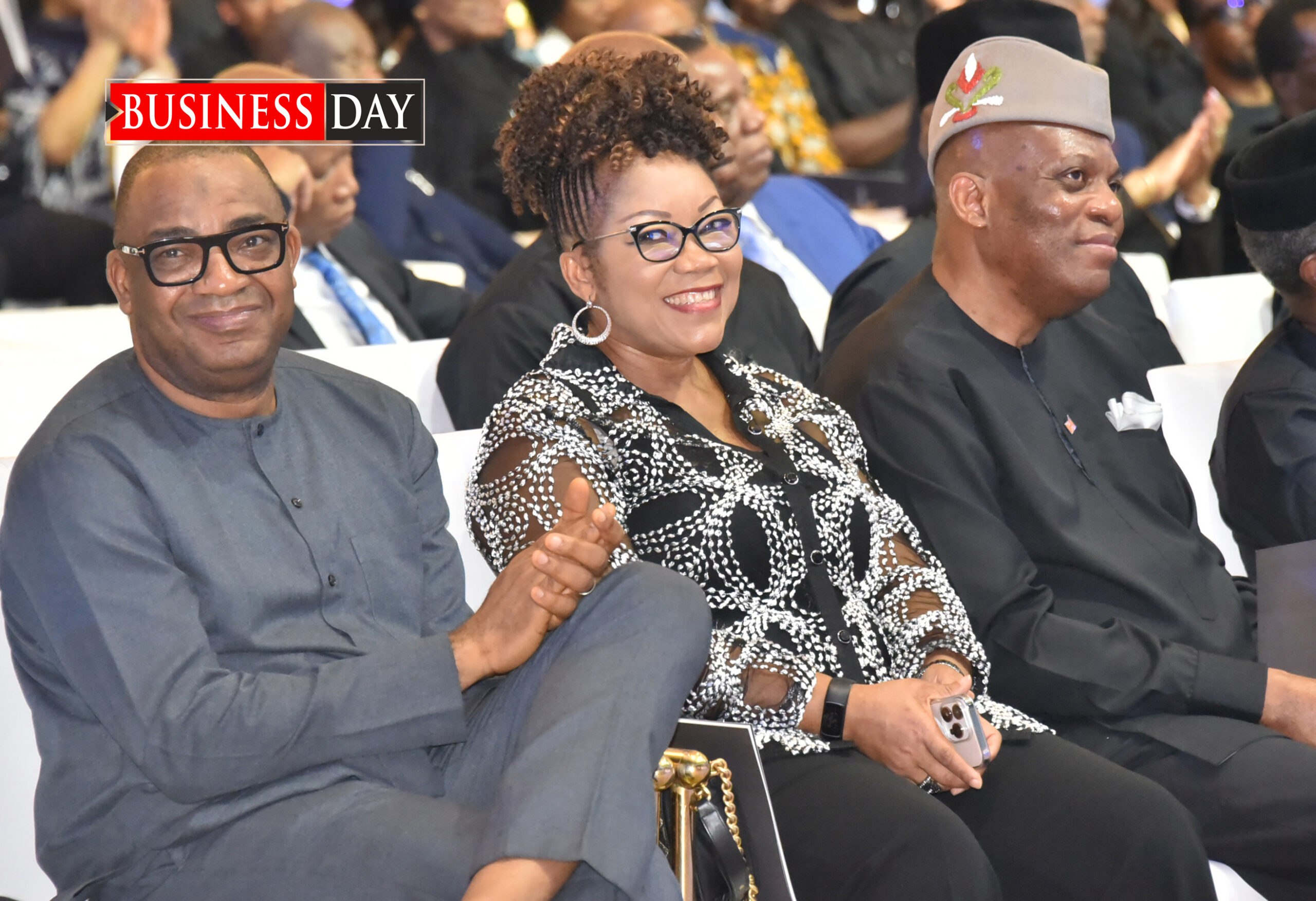 L-R: Abubakar Jimoh, chairman, Access Holdings plc; Mfom Usoro; and Paul Usoro, chairman, Access Bank plc.
