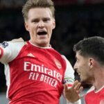 Arsenal sink Luton to regain Premier League top spot