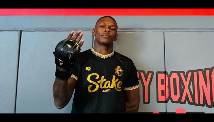 Social media abuzz as UFC Champion Adesanya dons Enyimba jersey