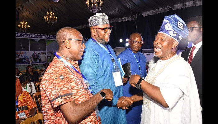 The NDDC Executive Director, Corporate Services, Hon. Ifedayo Abegunde, welcomes the Anchor of Inside the Niger Delta, Mr. Felix Akugha, (Middle) to the region-wide media engagement in Port Harcourt. First left is the General Manager of Rivers State Broadcasting Corporation Sir Sampson Fiberesima