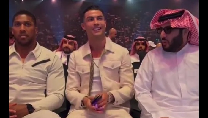 Cristiano Ronaldo flaunts £4.5m outfit, sits with Anthony Joshua at Fury vs Usyk fight