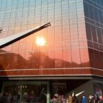 Nike reports higher profits as shares fall on poor outlook