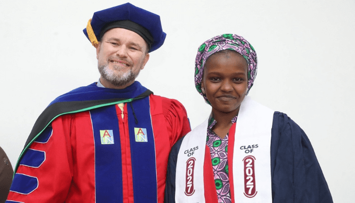 AUN President, Frazier, and new student