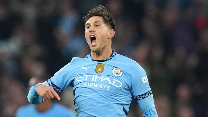 Stones' 98th-minute equaliser salvages point for Man City against 10-man Arsenal