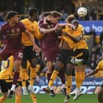 Man City edge Wolves 2-1 in controversial victory