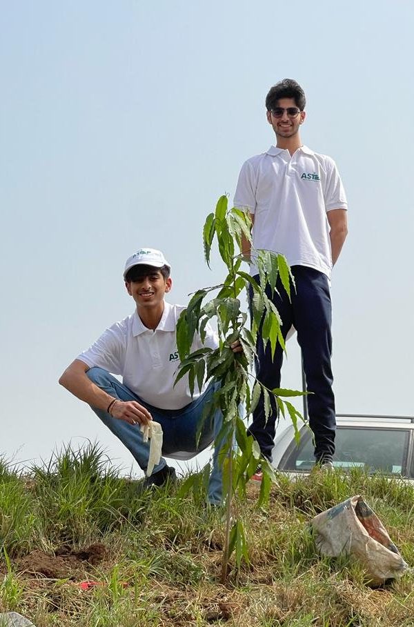 Arjun Gupta and Darsh Gupta planted a sapling on the occasion of "The Evergreen Project" at Lagos.