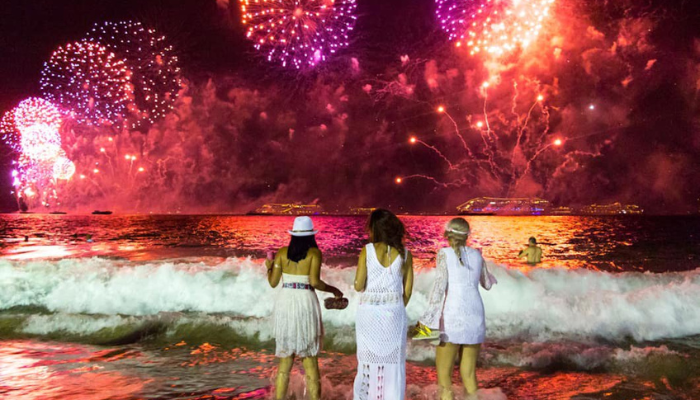 Brazil Wearing white and jumping into the ocean