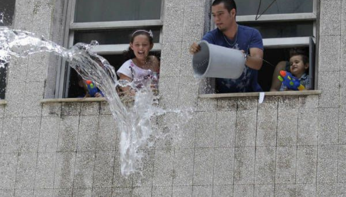 Cuba Throwing water out the front door