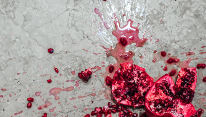 Greece Hanging and smashing pomegranates