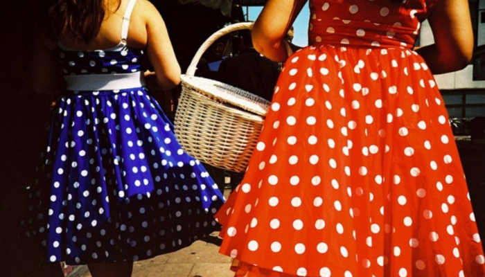 Philippines Wearing polka dots and eating round fruits