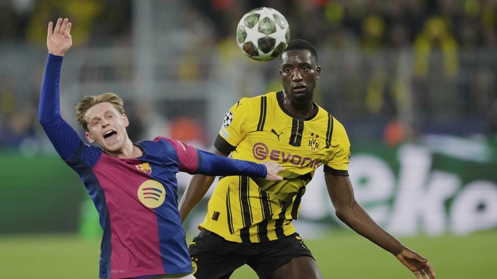 Champions League: Barcelona survive Dortmund scare to reach semi-finals