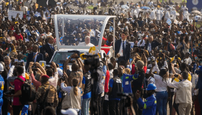 Francis arrives in the popemobile at Ndolo Airport to preside over a Mass in Kinshasa, the Democratic Republic of the Congo, on February 1, 2023. [Gregorio Borgia/AP Photo]