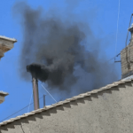 A second day of voting in the papal conclave began Thursday morning without a breakthrough, as black smoke once again billowed from the Sistine Chapel’s chimney, indicating that no new pope has been elected.