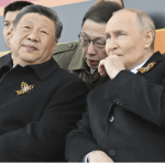 Putin and Xi lead victory day parade amid show of unity and defiance