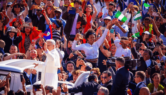 Nigerian wave the national flag in Rome