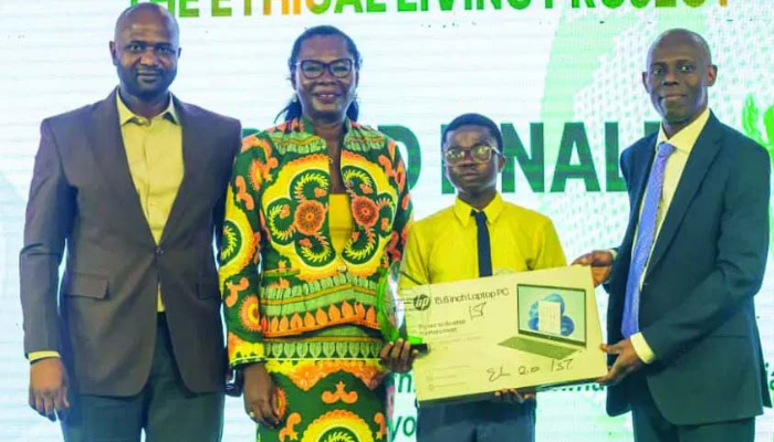 Michael Ajayi, country director, Enactus Nigeria; Uwa Osa-Oboh, executive, ACA Foundation; Samuel Opadotun, (Ebute Elefun Senior High School, Sura, Lagos Island), and Paul Kokoricha, chairman, ACA Foundation Council, at the grand finale and award ceremony of Ethical Living Essay Competition in Lagos.
