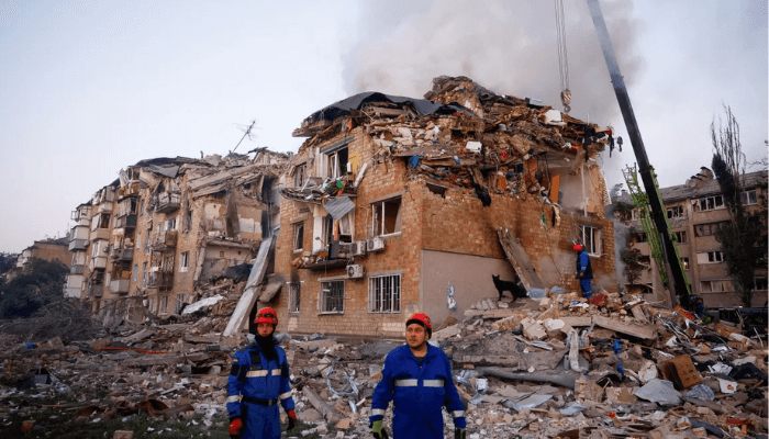 Russia pounds Kyiv with missiles, killing 14 people including four children