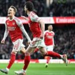 Arsenal reclaim Premier League top spot with 2–1 win over Brighton