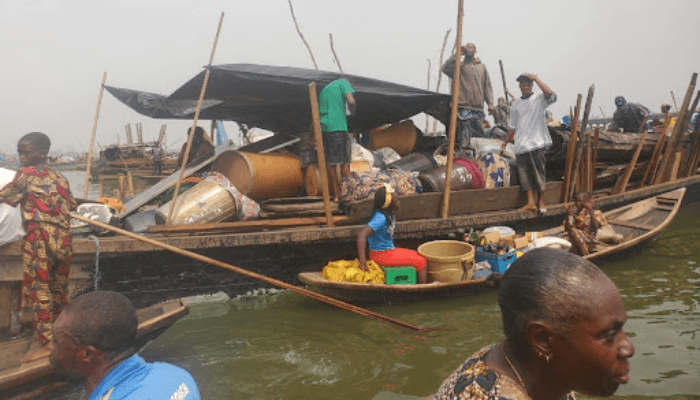 Displaced family at Makoko Waterfront living in the boat
